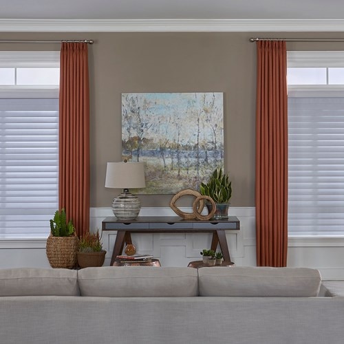 The Room Darkening Sheer Shades paired with the easy classic pleat drapery. Sheer Shade Color: 3” Soft White S70PN100D; Drapery Color: Athena Red Earth 1003