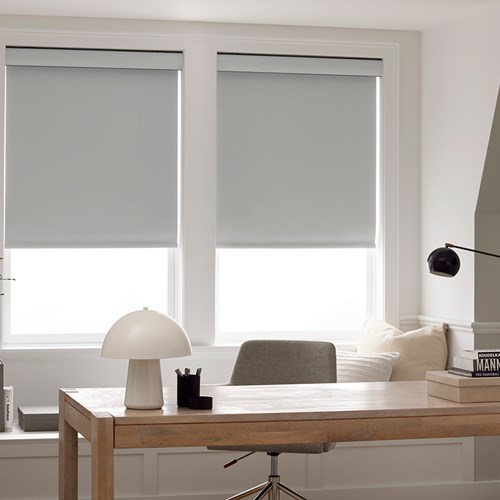 The Economy Fabric Blackout Roller Shades in the Lexington Smoke color with the 4in. Valance.