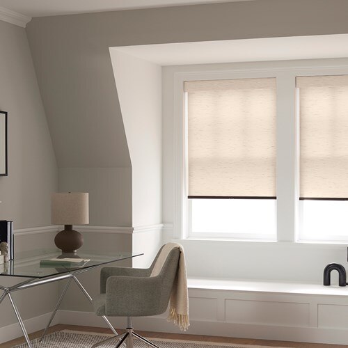 The Premium Light Filtering Roller Shades in the Milan Graphite color with the Fabric Wrapped Cornice.
