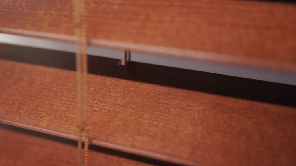 Are faux wood blinds room darkening? The Finishing Touch