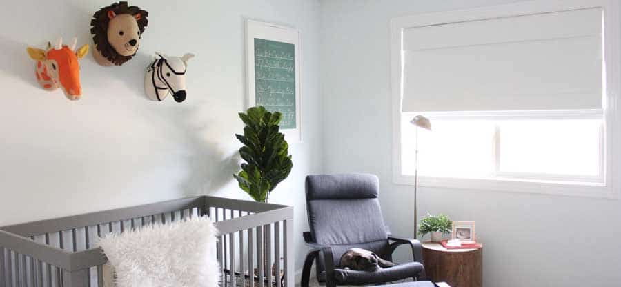 White Cordless Blackout Roman Shades For A Gender Neutral Nursery 2 Nursery Window Treatment Features You Definitely Need