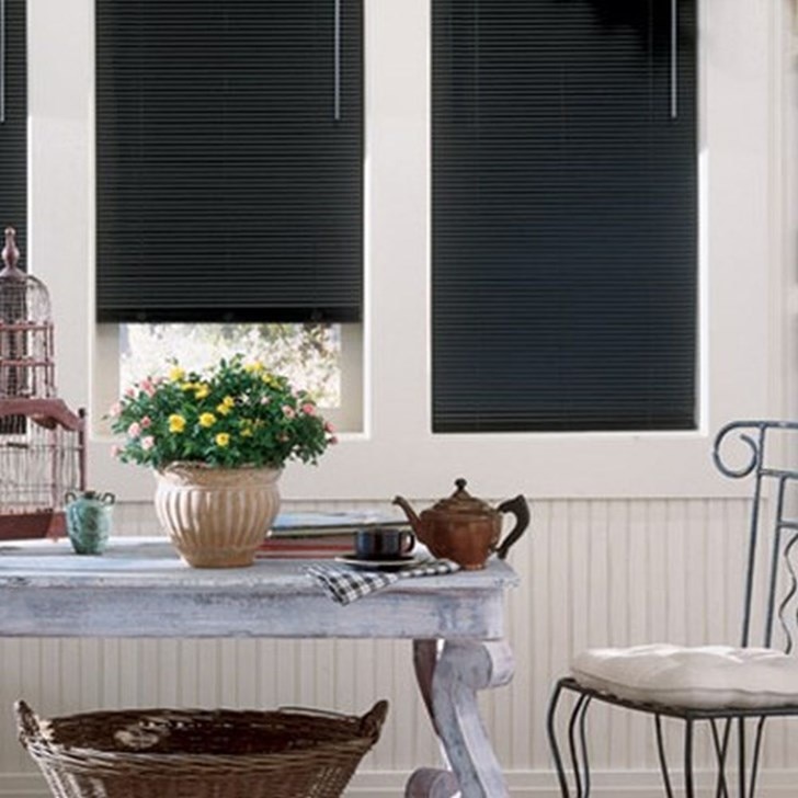The Bali 1/2" Lightblocker Micro Aluminum Blinds feature contemporary style perfect for doors and windows with shallow depths.