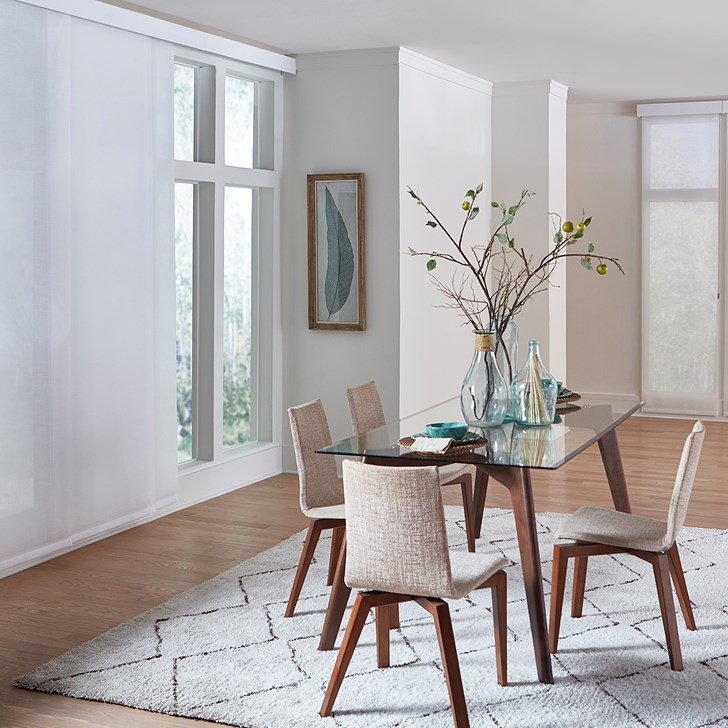 Premium Solar Roller Shades combined with fabric sliding panels. Color: Flaxen 11% Pure White