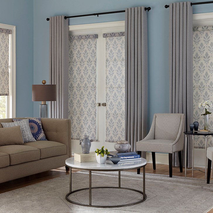 The light filtering shade paired with the easy grommet drapery. Shade Color: Majesty Pewter; Drapery Color: Brisbane Clear Sky