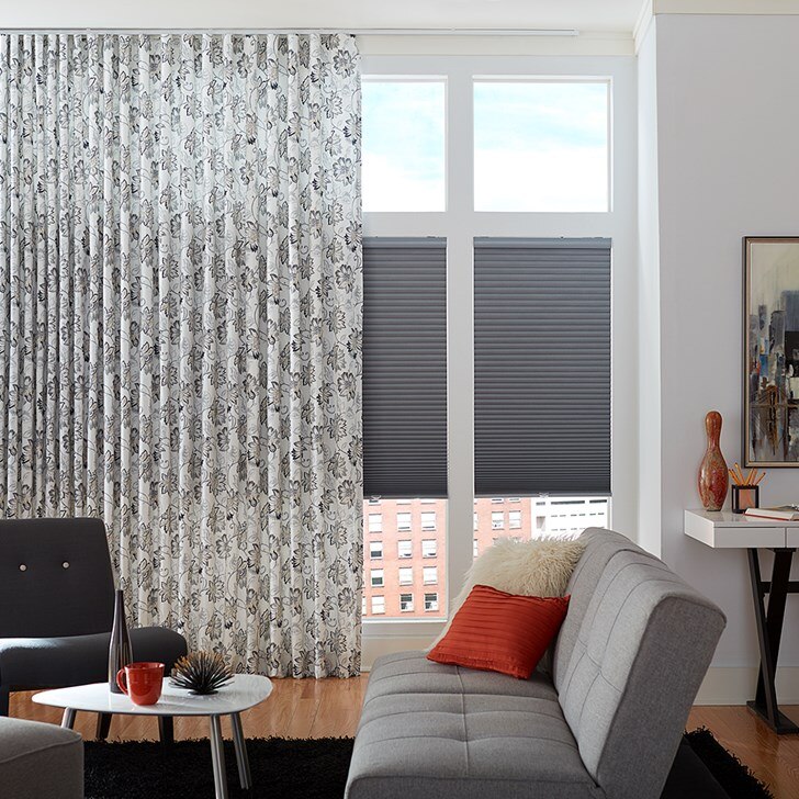 Blinds.com Budget Cordless Blackout Cellular Shade in Storm paired with Blinds.com Easy RippleFold Drapery Panel in pattern Wells Ink