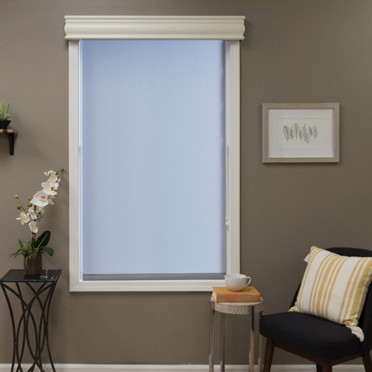 Blinds.com Balmoral Wood Cornice in Davenport Cotton 6011 paired with Blinds.com Signature Light Filtering Roller Shade in Carousal Steel.