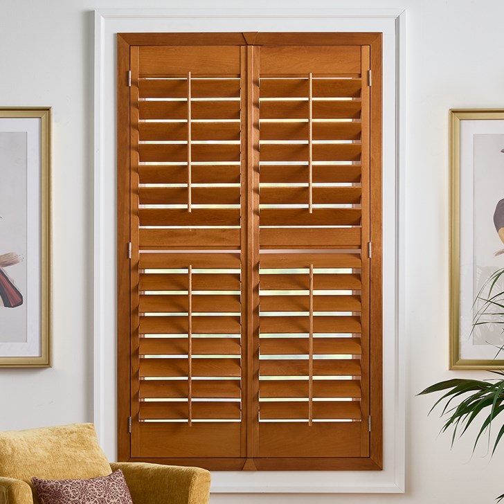 Color: Golden Oak; Frame: Z Overlap; Slats: 3.5 Inch Louver; Split: Divided in the Middle; Panels: Two Panel Split